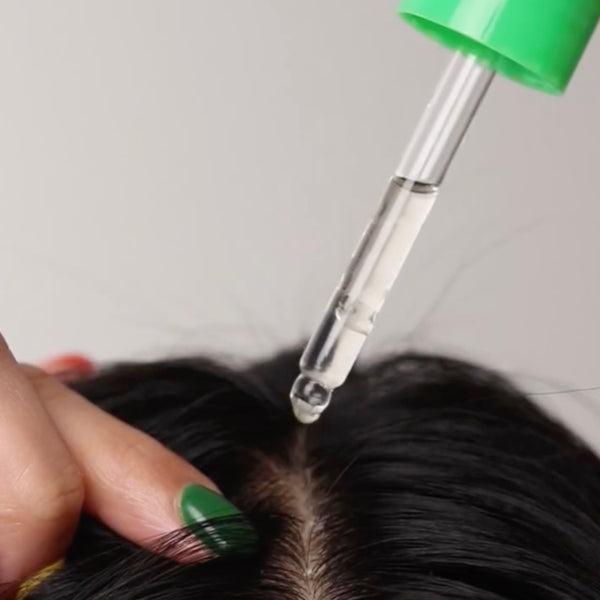 6. After showering, section damp (or dry) hair and dispense ~1 dropper of serum onto the scalp.